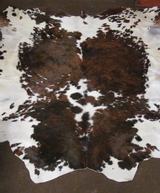 A hide rug 87" x 81"