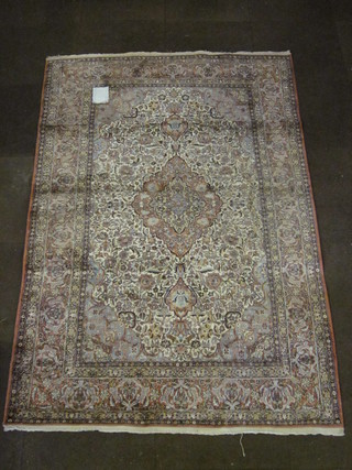 A fine quality pink silk Persian rug with central medallion within multi-row borders 81" x 52"