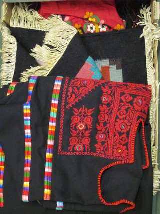 An Eastern canvas bag, a Russian style dress, a Caftan and a  small Kelim slip rug