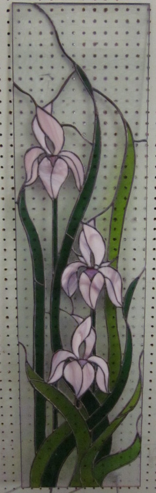 4 stained glass panels depicting flowers 36" x 9 1/2"