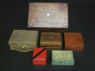 A rosewood trinket box with hinged lid inlaid mother of pearl stringing 10", a small leather jewellery case and 3 other small  boxes