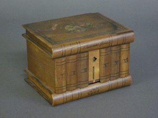 An inlaid olive wood trinket box in the form of a collection of books with hinged lid 6"