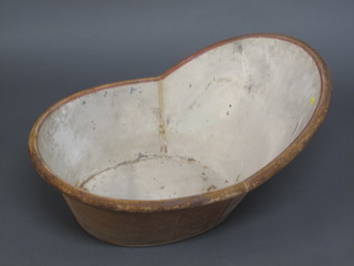 A pressed metal hip bath 33"