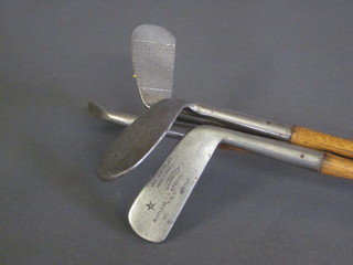 4 hickory shafted golf clubs by H A Aldwick - a Niblick, a  special Mashie, a special 2 iron and a special putter