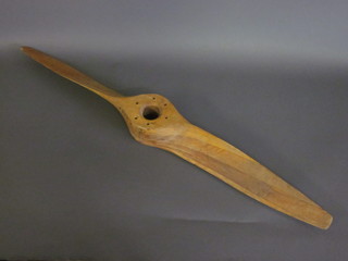 A wooden propeller 44" long