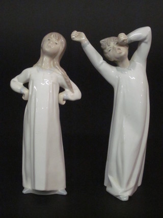 A Lladro figure of a standing girl in night gown 8", f and r, and  a do. standing boy 8"