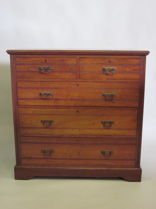 An Edwardian walnut chest of 2 short and 3 long drawers, raised  on a platform base 39"