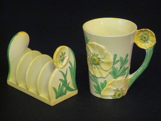 A Carltonware Australian design buttercup pattern mug and a do.  5 bar toast rack