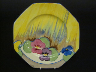 A Clarice Cliff Bizarre octagonal and yellow glazed plate 7 1/2"
