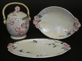 A Malingware lustre twin handled bowl 11" and a do. dish 12"