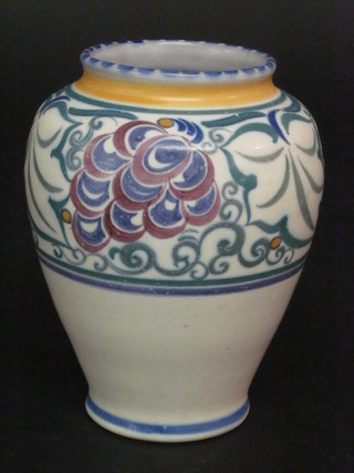 A Poole Pottery vase decorated grapes, the base impressed  Saddler Adam Poole 6"