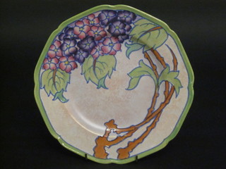 A Charlotte Rhead Crown Ducal circular plate with floral  decoration, the reverse marked H3797 10"