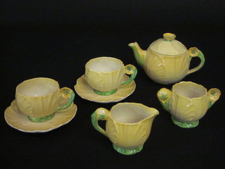 A Carltonware Australian design 5 piece buttercup pattern tea  service comprising teapot, twin handled sugar bowl, milk jug, 2  cups and saucers