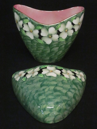 A Malingware green lustre boat shaped vase 7" and a do. wall pocket 6"