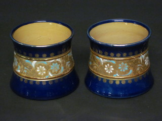 A pair of Royal Doulton blue salt glazed vases, 1 f and r, 3 1/2"