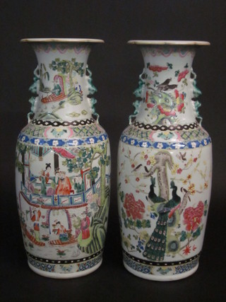 A pair of Canton style famille rose twin handled vases, decorated courtly figures 23"