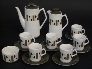 A 15 piece Beswick coffee service comprising coffee pot, hotwater jug, sugar bowl, 6 coffee cups and 6 saucers, 1 handle  cracked,