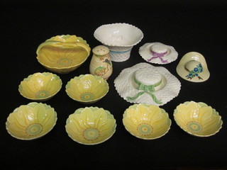 A Woods sunflower pattern oval pottery dish and 6 matching bowls, 2 flower rings in the form of hats, a wall pocket in the  form of a straw hat, a circular basket shaped bowl and a sugar  sifter decorated a bird on branch