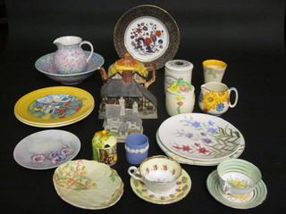 A multicoloured pottery jug and bowl, a Cottageware teapot and a collection of decorative ceramics