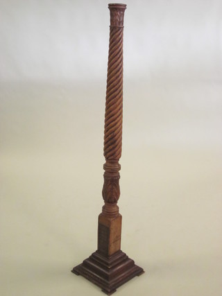 A Victorian mahogany bed post torchere
