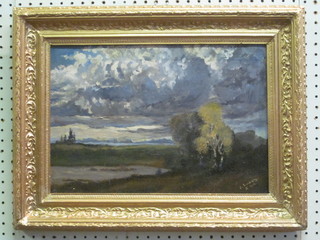 J Ludwig, oil on canvas "Moorland Scene with Heavy Clouds"  10" x 15", contained in a gilt frame