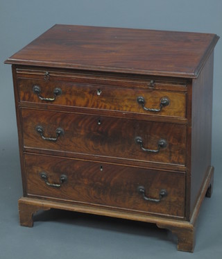 A Georgian mahogany chest with brushing slide above 3 long graduated drawers, raised on bracket feet 31"