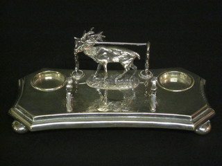 A Victorian Britannia metal standish with pen rest decorated a  Stag, raised on bun feet 9"