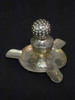 A novelty silver table lighter with golf ball finial, marks rubbed