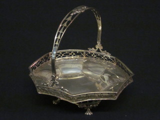 An Edwardian silver octagonal shaped basket with pierced border  and swing handle, raised on panel supports, 4 1/2 ozs