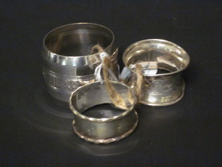 2 silver napkin rings and 1 other