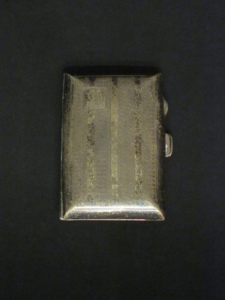 A silver cigarette case with engine turned decoration,  Birmingham 1929