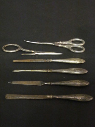 6 various silver handled manicure implements