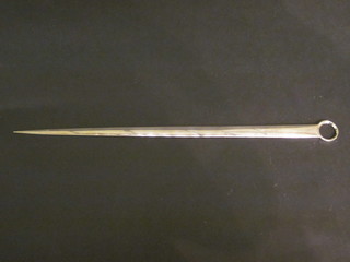 A large 19th Century silver plated meat skewer with armorial decoration, 16"