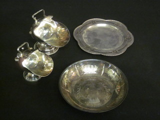 A circular engraved silver plated dish decorated a thistle, 1 other  and 2 silver plated sugar scuttles