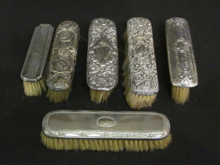5 silver backed clothes brushes and 1 other