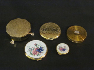An octagonal gilt metal dressing table box by Stratton, 3  compacts and a pill box