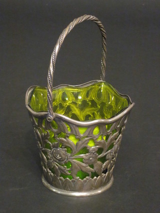 A circular pierced WMF basket with green glass liner