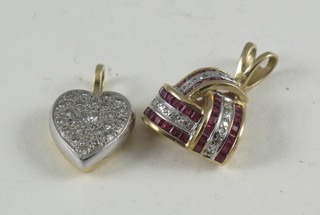 A 9ct gold pendant set rubies and diamonds together with a 9ct gold heart shaped pendant set diamonds