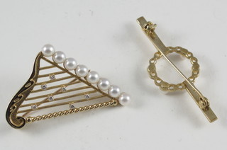 A 9ct gold bar brooch set pearls in the form of a harp together  with a gold bar brooch set demi-pearls