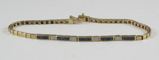 A 9ct gold box link bracelet set sapphires and diamonds
