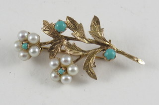 A 9ct gold floral spray brooch set pearls and turquoise