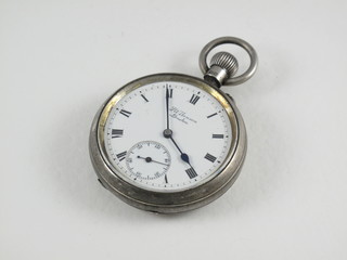 An open faced pocket watch by JW Benson contained in a silver case