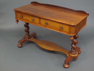 A Victorian mahogany wash stand/side table, raised on spiral  turned columns with undertier 45"