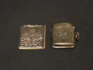 A silver vesta case together with a miniature Pear's calendar for  1917 with silver cover