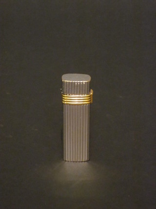 A Christian Dior silver plated lighter