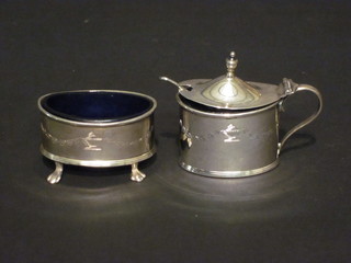 A 2 piece silver oval Georgian style condiment set with mustard  pot and salt, Birmingham 1922, complete with blue glass liners,  2 ozs