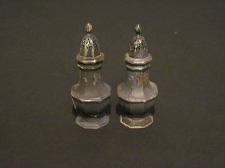 A pair of Georgian style silver pepperettes Birmingham 1900