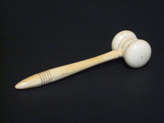 A turned ivory gavel