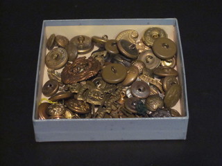 A collection of military buttons etc