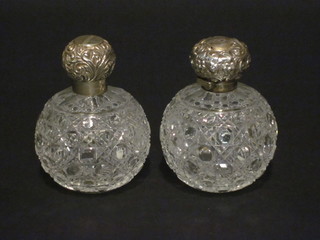 2 globular shaped cut glass scent bottles with embossed silver  lids, 1 f, 3"